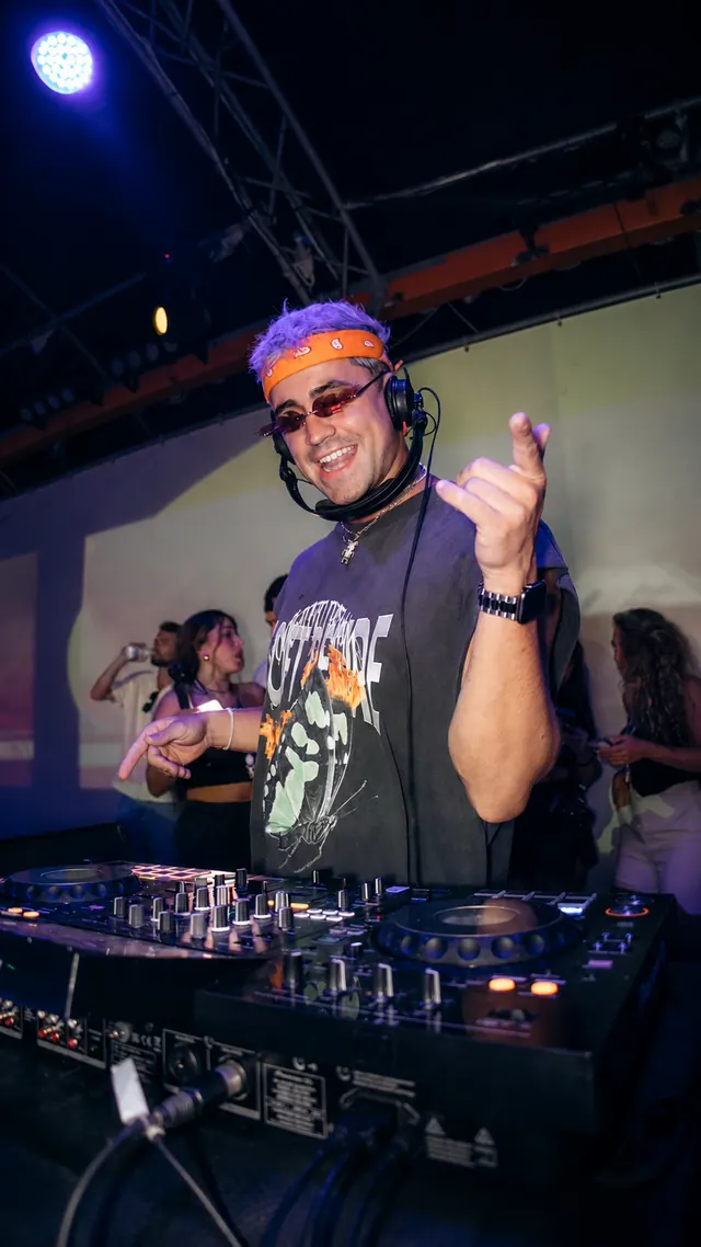 JK behind the decks at Aria Complex, vertical clip